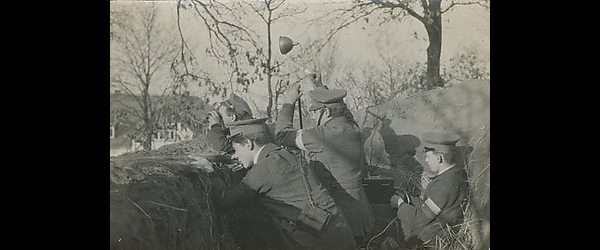 Soldiers in trench with field telephone