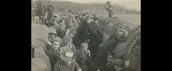 Soldiers and civilians in trench