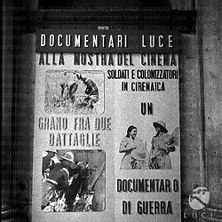 Cartello pubblicitario di un documentario Luce di guerra "Grano fra due battaglie, soldati e colonizzatori in Cirenaica"; totale