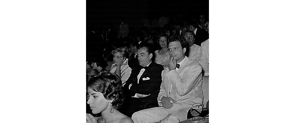 Spoleto Luchino Visconti e Franco Interlenghi seduti in platea