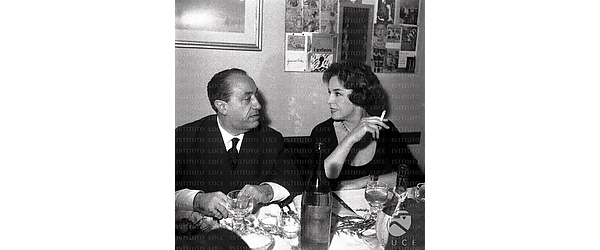 Rodolfo Arata e A. Proclemer seduti al tavolo del ristorante